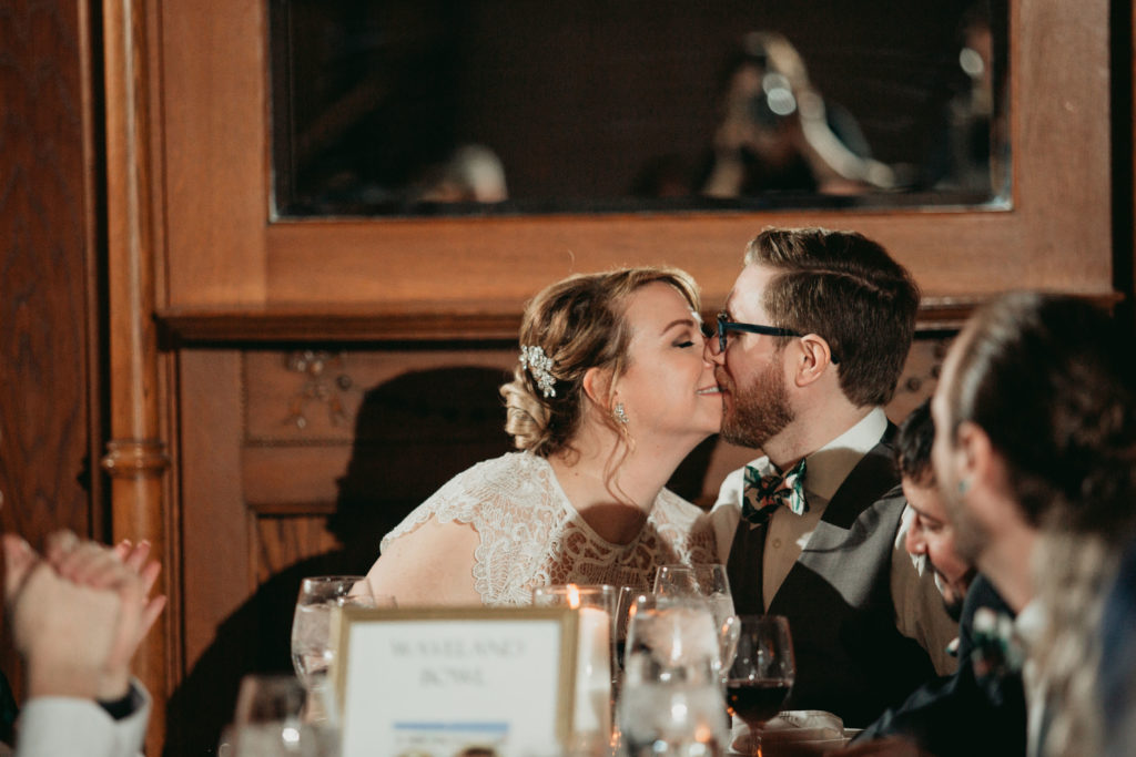 Bride and groom kissing