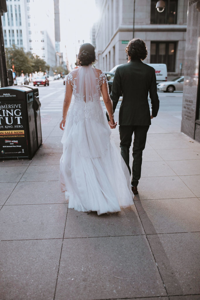 bride and groom with second wedding photographer