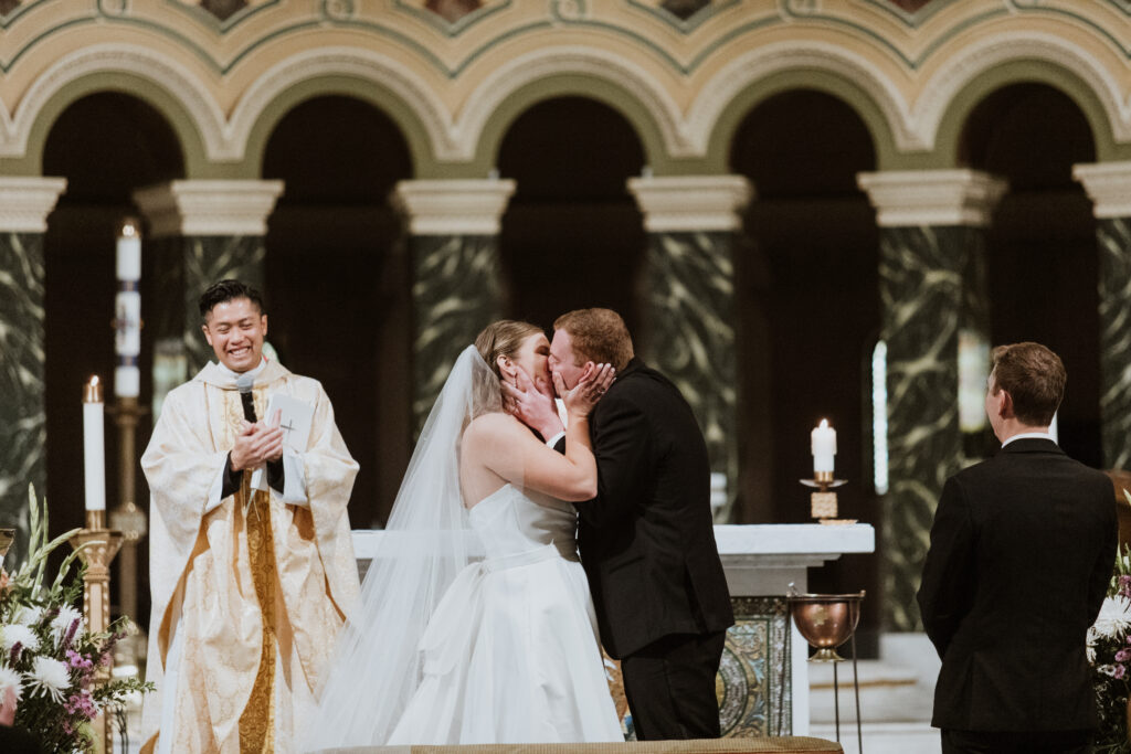 one of the church wedding photography: Savor the kiss for the camera.