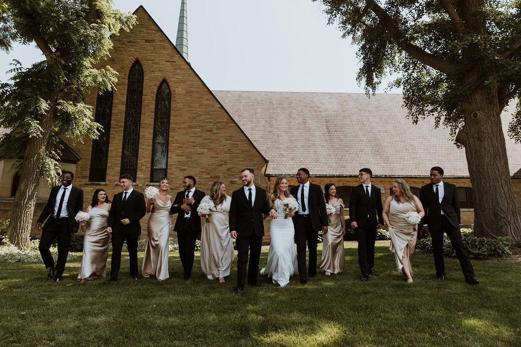 bride and groom with friends